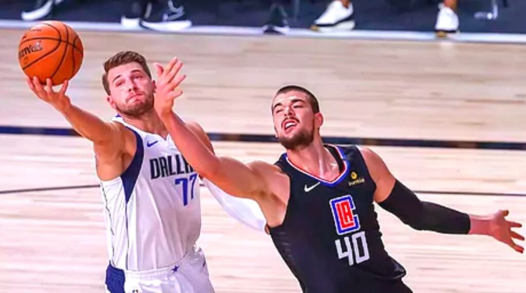 Doncic fights a ball
