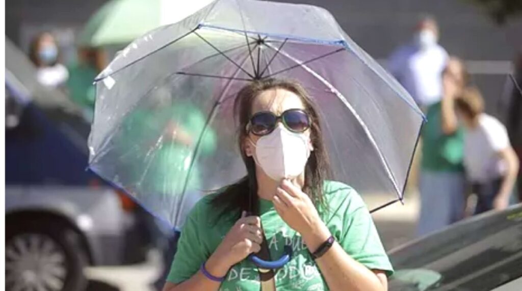 woman covers face